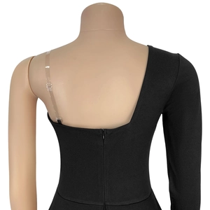 Detail view of black one-shoulder dress with invisible back zipper and adjustable strap