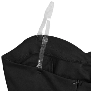 Detail of adjustable transparent plastic shoulder strap and invisible zipper on black dress