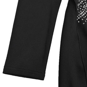Detailed macro shot of black V-neck dress cuffs featuring silver rhinestones and metal studs