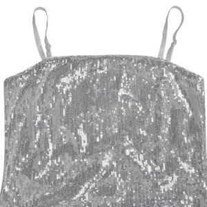 Detail of silver sequined fabric and adjustable spaghetti straps for party evening dress