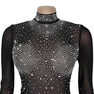Detail of sheer black mesh top with sparkling silver rhinestone gradient embellishments