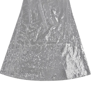 Detailed macro view of shimmering silver sequins on an elegant evening party dress