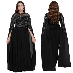 Elegant black long dress with silver rhinestones and split cape sleeves on white background