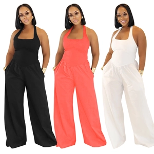 Women's backless halter jumpsuit with wide leg design in black, orange and white colors