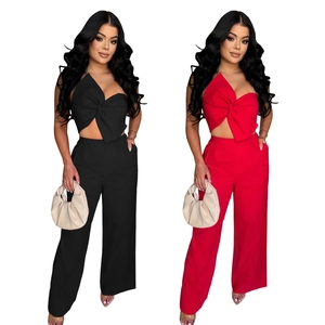 Women's two-piece set featuring a bow knot halter top and high-waisted wide-leg trousers
