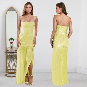 Sparkling yellow sequin evening dress with thin straps and a side slit for formal events