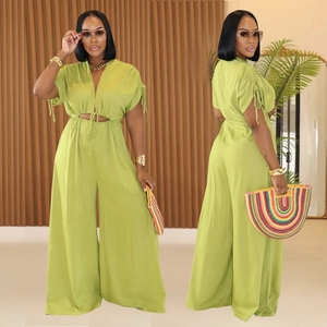 Women's V-neck wide leg jumpsuit in bright green with waist cutout and drawstring