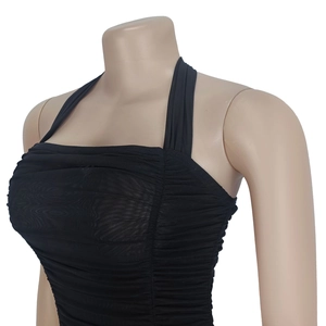 Detail of ruched black mesh halter neck top featuring fine pleats and slim-fit design