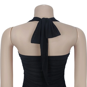 Close-up of black mesh halter neck top with tie-back bow detail and ruched texture