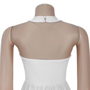 Close-up of white halter neck jumpsuit featuring backless design with two button fasteners