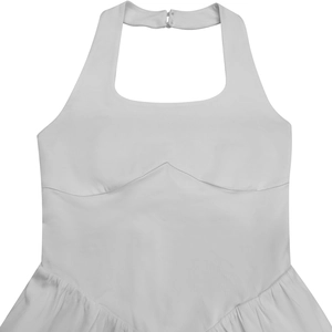 Detail of white halter neck jumpsuit with square neckline and gathered fabric texture
