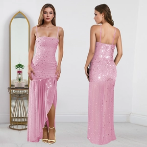 Detail view of pink sequin dress with spaghetti straps and high side slit design