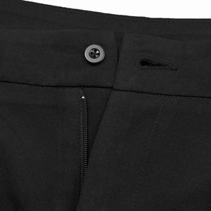 Detailed view of the black waist button and hidden zipper on high-quality twill pants