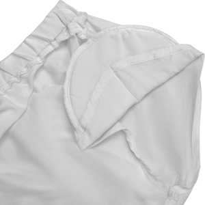 Détail de la taille élastique et de la doublure intérieure de la robe longue blanche