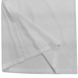Detail shot of the backless white jumpsuit hemline showing high-quality stitching