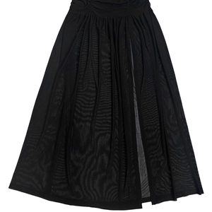 Detail showing the sheer mesh fabric, ruched waist design, and side slit of the black dress