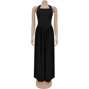 Detailed view of black halter neck jumpsuit featuring stylish V-shaped waist stitching