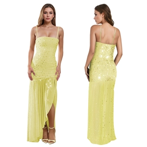 Detail of yellow sequin evening dress featuring thin straps and elegant side slit