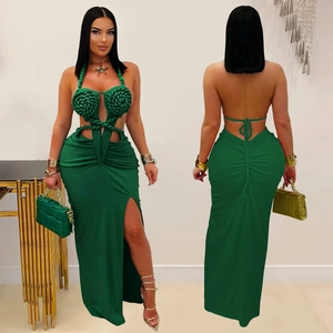Front and back detail of emerald green halter neck dress with cutout and high side slit