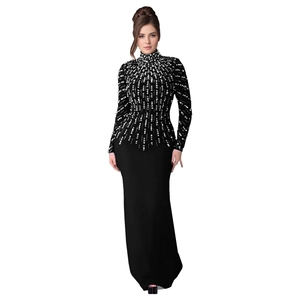 Elegant black long sleeve evening dress with sparkling silver beads in radial pattern