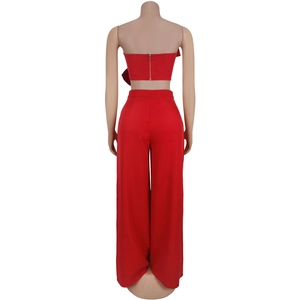 Back view of a red two-piece set featuring an off-shoulder top and high-waist wide-leg pants