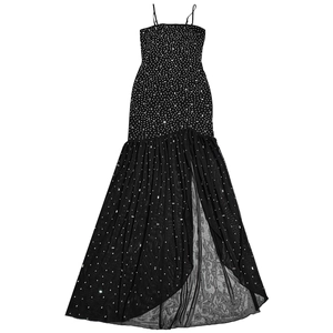 Close-up of black slit dress with sparkling silver rhinestones and sheer tulle hemline