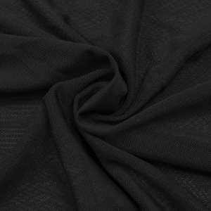 Vue détaillée du tissu en maille noire semi-transparente avec texture nid d'abeille