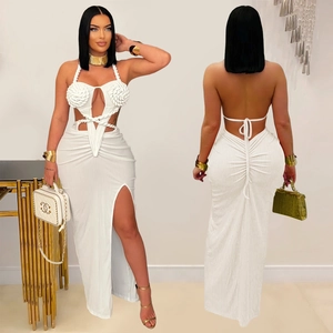 Front and back detail of white halter neck dress with 3D flower and cutout design