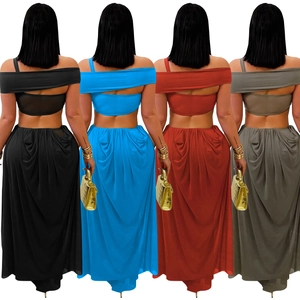 Detailansicht figurbetontes trägerloses Netzkleid in Schwarz, Blau, Rost und Taupe