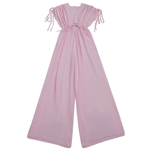 Detail view of light pink V-neck jumpsuit with waist drawstrings and shoulder ties