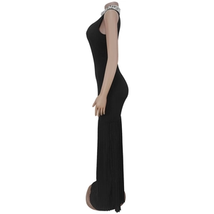Detail of elegant black sleeveless dress featuring rhinestone collar and pleated fishtail hem