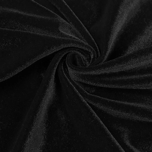 Vue détaillée de la texture du velours noir avec un éclat soyeux et un drapé élégant