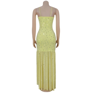 Back view of sexy yellow sling dress with silver rhinestones and mesh pleated hem detail