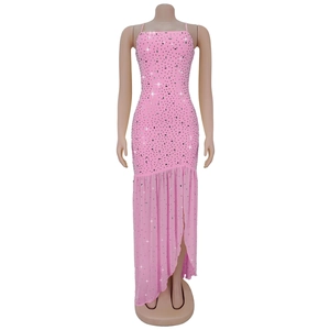 Close-up of pink slim fit rhinestone dress featuring spaghetti straps and high slit detail