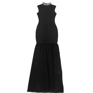 Detail of high neck black dress featuring grey pearl embellishments and pleated texture