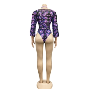 Rear view of long-sleeve crop top and high-cut briefs with purple peacock feather print