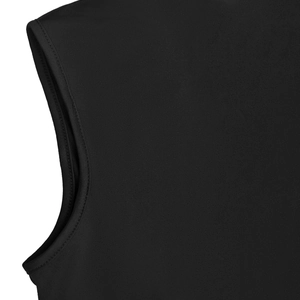 Macro detail of the smooth armhole piping and double stitching on a black knit dress