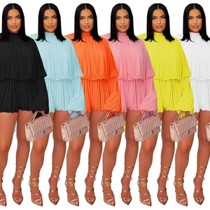 Women's pleated long sleeve playsuit available in six vibrant colors with elastic waist