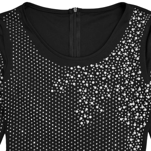Close-up of elegant black dress featuring white faux pearls and silver rhinestones details