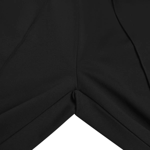 Detailed close-up of high-quality double-stitched crotch seams on black tailored trousers