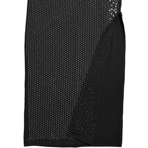 Detailed view of silver rhinestones and high side slit on an elegant black evening dress