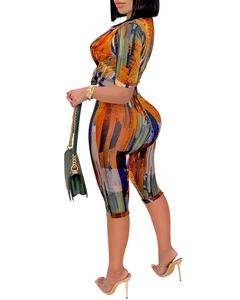 Detailed side view of fashion two-piece set with abstract print and slim fit shorts