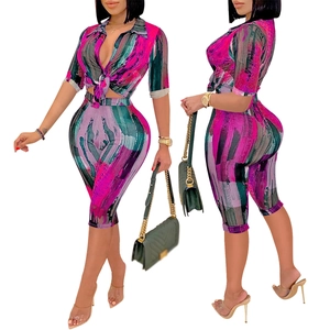 Women's 2 piece set featuring abstract print V-neck crop top and high waist leggings