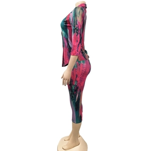Detail view of colorful abstract oil painting print on the two-piece short sleeve set