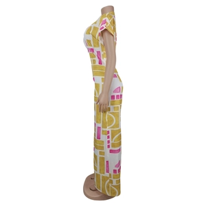 Detail view of women's summer short sleeve jumpsuit with colorful abstract geometric prints