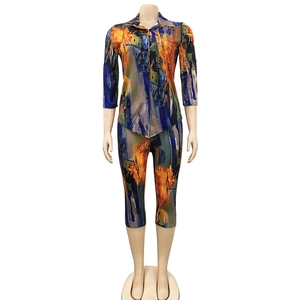 Detail of multi-color abstract oil painting print on V-neck short sleeve two-piece set