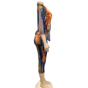 Detail of a two-piece set featuring vibrant abstract oil painting print and a slim fit