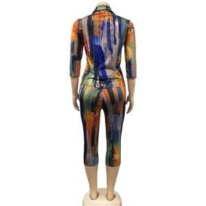 Rear view of women's casual two-piece set featuring vibrant abstract oil painting print