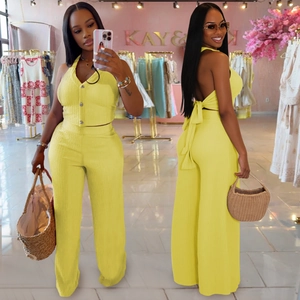 Detailed front and back views of a yellow halter top and wide-leg trousers set