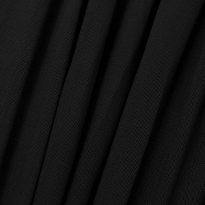 Detailed macro view of black pleated elastic knit fabric with fine vertical texture